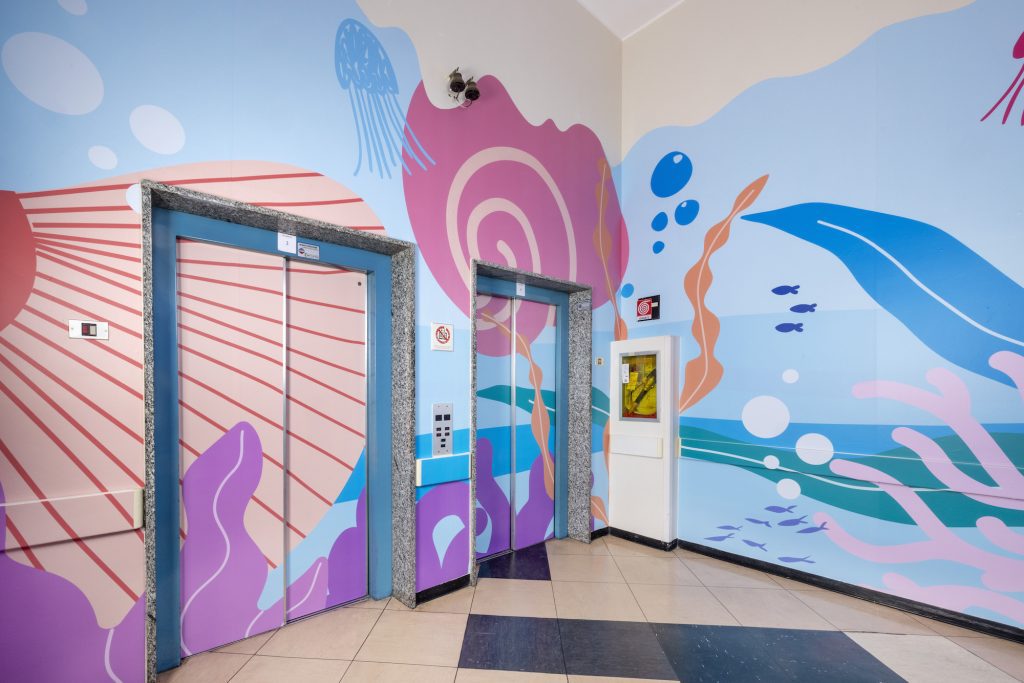 Hospital wall decorated colourfully with print outs from the TrueVIS AP-640