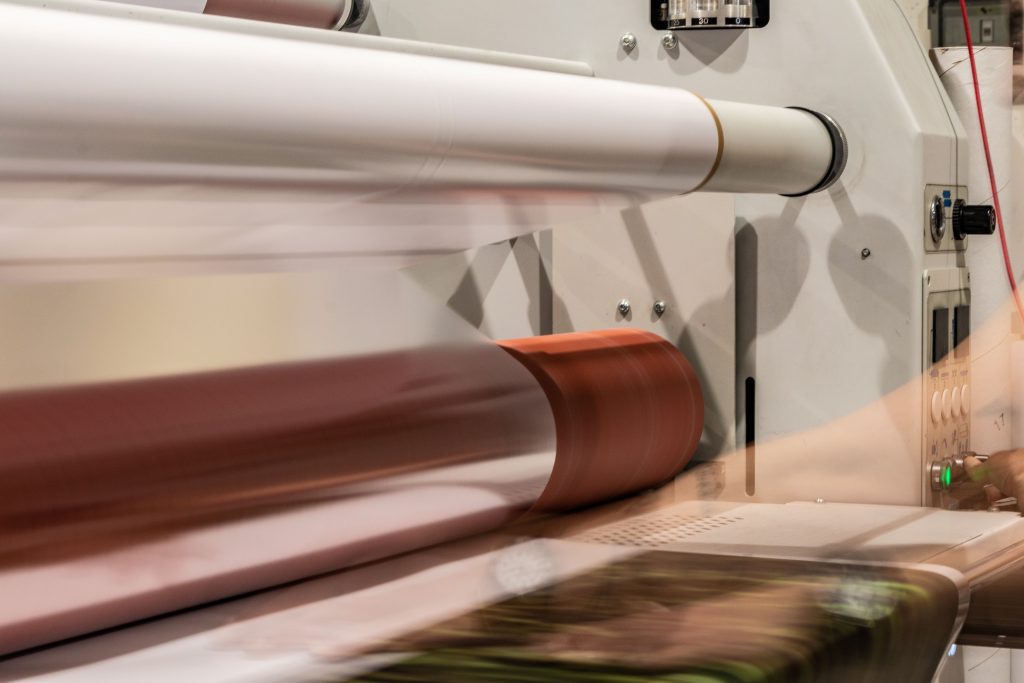 mistakes in lamination blog image: laminator in action