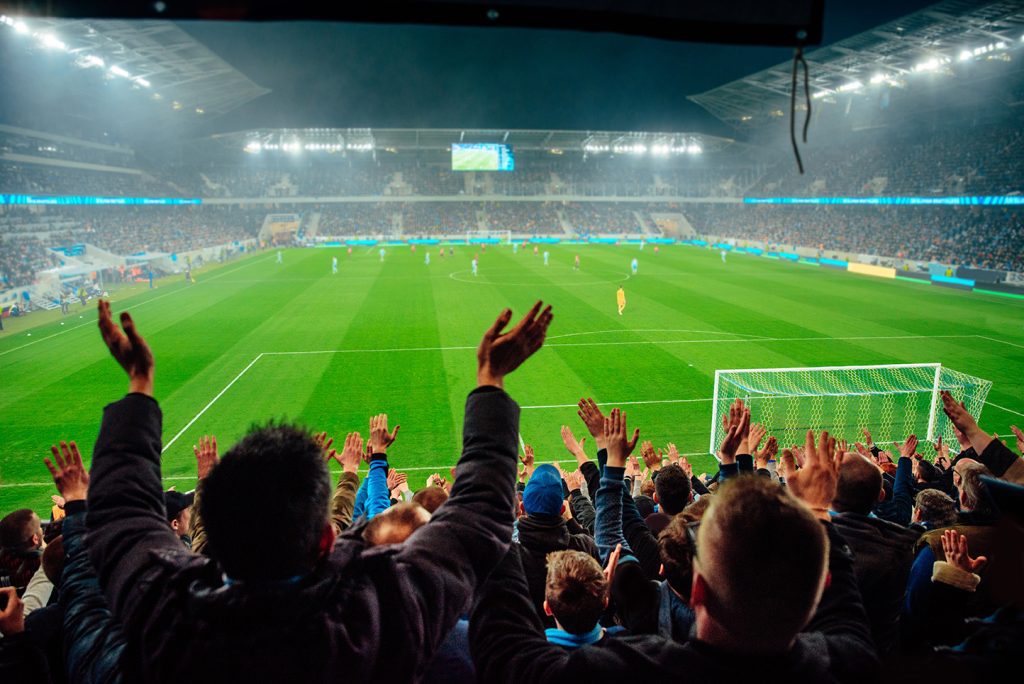 LED signage at far end of football pitch