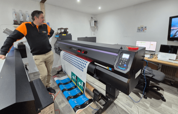 Andy Wall pictured with the Mimaki UCJV300-160